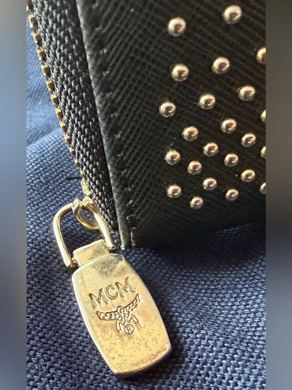 EUC - MCM Black Studded Zip-Around Wallet with Gold Logo